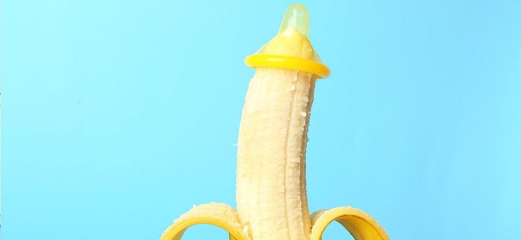 banana in a condom as an imitation of penis enlargement without surgery